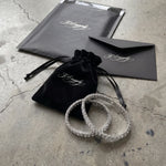 304supply White Ice Ice-Armband mit klaren Zirkonia als Flatlay